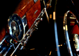 SCP_13 Mustang 300 behind the steering wheel dash with gorgeous red wood combined with chrome dials, buttons and air vents.